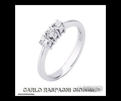 ANELLO TRILOGY ORO 18kt. CON DIAMANTI NATURALI