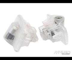 LUCI LED PROIETTORI LOGO Nissan PORTIERE Kit Luci