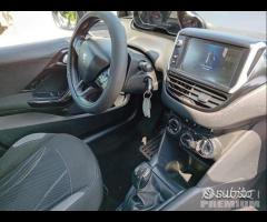 Peugeot 208 5p-1.4 hdi-full-2013 - 21