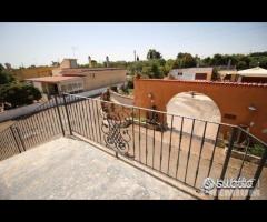 Proprietà con attivita' commerciale - 8