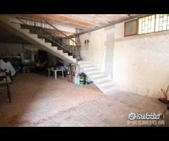 Proprietà con attivita' commerciale - 28