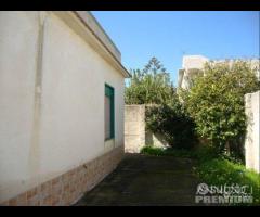 Triscina villetta con veranda e giardino