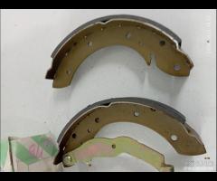 GANASCE FRENO POSTERIORI X4 BMW 316 318 DAL 1990 G