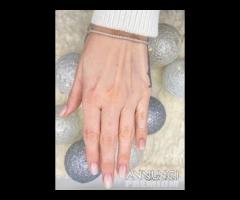 BRACCIALE TENNIS ORO 18kt. E DIAMANTI NATURALI