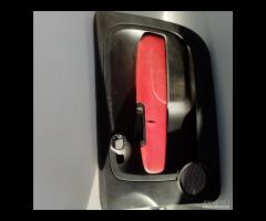 Tappezzeria in pelle nera-rosso completa di pannel