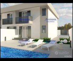 Ville capofile con piscina