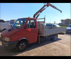 Iveco Daily con gru fassi