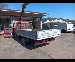 Iveco Daily con gru fassi