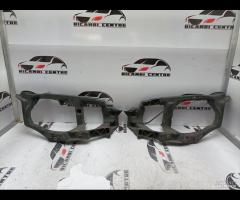 SUPPORTO FANALE ANTERIORE SX/DX MITSUBISHI COLT MN