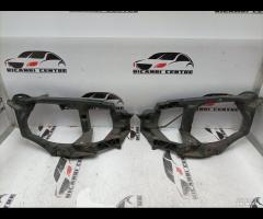 SUPPORTO FANALE ANTERIORE SX/DX MITSUBISHI COLT MN