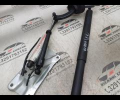 PISTONE PORTELLONE POSTERIORE DX+SUPPORTO 2010 MER