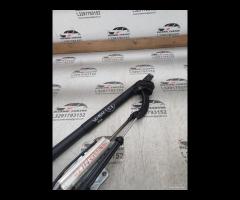 PISTONE PORTELLONE POSTERIORE DX+SUPPORTO 2010 MER - 23