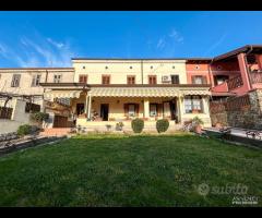 Villetta a schiera - con giardino