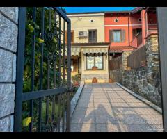 Villa a schiera - con giardino