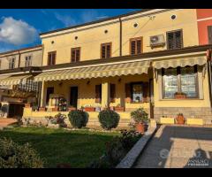 Villa a schiera - con giardino