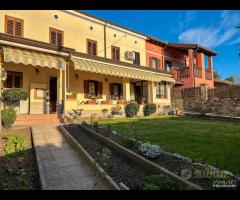 Villa a schiera - con giardino