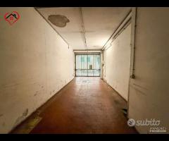 PADUINA - Posto auto in autorimessa