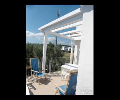 Appartamento con terrazza in villa vicino al mare