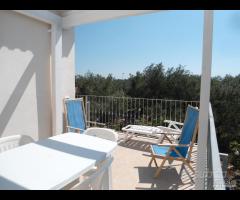 Appartamento con terrazza in villa vicino al mare
