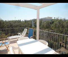 Appartamento con terrazza in villa vicino al mare
