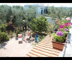 Appartamento con terrazza in villa vicino al mare