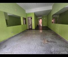 Bottega ad una luce via placida