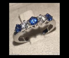 ANELLO FEDINA ORO 18kt. DIAMANTI E ZAFFIRI BLU