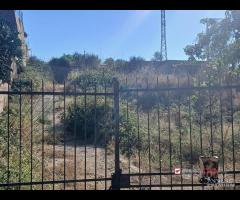 Terreno con deposito
