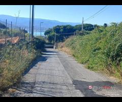 Terreno con deposito
