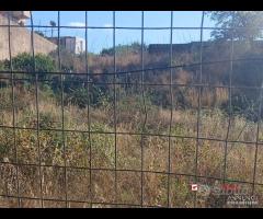 Terreno con deposito