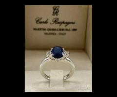 ANELLO ORO 18kt. CON DIAMANTI E ZAFFIRO BLU OVALE