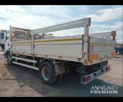 Nissan atleon 120 cassone fisso 5.30m