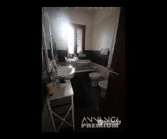 Appartamento a piano rialzato e garage