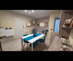 Cave, con serra solare, giardino e garage