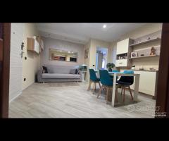 Cave, serra solare, giardino e garage