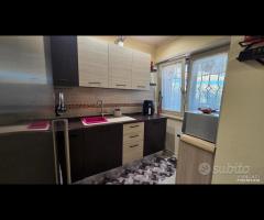 Cave, con serra solare, giardino e garage