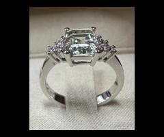 ANELLO ORO BIANCO 18kt. DIAMANTI ED ACQUAMARINA