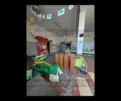 Locale commerciale e deposito ad Aci Catena