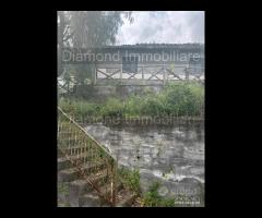 Casetta panoramica con terreno a Milo