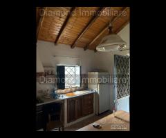 Casetta panoramica con terreno a Milo