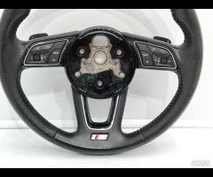 VOLANTE MULTIFUNZIONE STERZO IN PELLE TRAFORATA AU