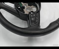 VOLANTE MULTIFUNZIONE STERZO IN PELLE TRAFORATA AU - 24