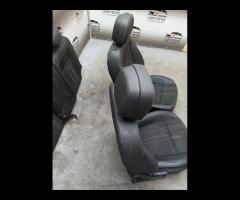 SEDILI IN PELLE \\ TESSUTO OPEL ASTRA J SPORTS TOU - 24