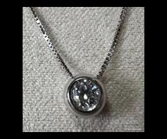 COLLANA PUNTO LUCE ORO BIANCO 18kt. E DIAMANTE