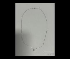 COLLANA PUNTO LUCE ORO BIANCO 18kt. E DIAMANTE