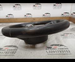 VOLANTE SPORTIVO MULTIFUNZIONE IN PELLE TRAFORATA - 12