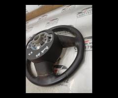 VOLANTE SPORTIVO MULTIFUNZIONE IN PELLE TRAFORATA - 24