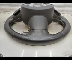 VOLANTE MULTIFUNZIONE STERZO IN PELLE TRAFORATA AU - 16