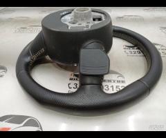 VOLANTE MULTIFUNZIONE STERZO IN PELLE TRAFORATA AU - 17