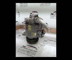 Compressore climatizzatore con giunto elettromagn.